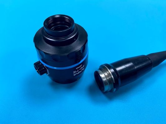 العدسة التركيزية لـ Olympus A10-T1E تتصل برأس الكاميرا